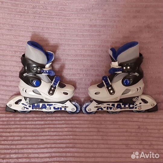 Роликовые коньки