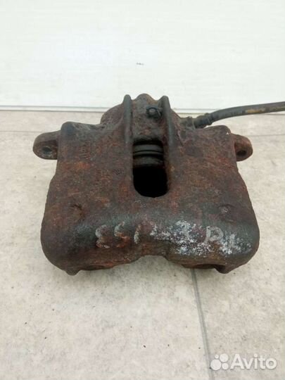 Суппорт тормозной передний левый Renault Espace 3