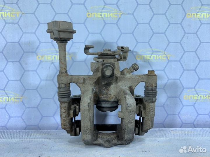 Суппорт тормозной задний правый Opel Astra J