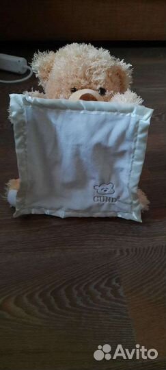 Плюшевый медведь музыкальный