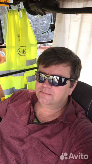 Машинист катка