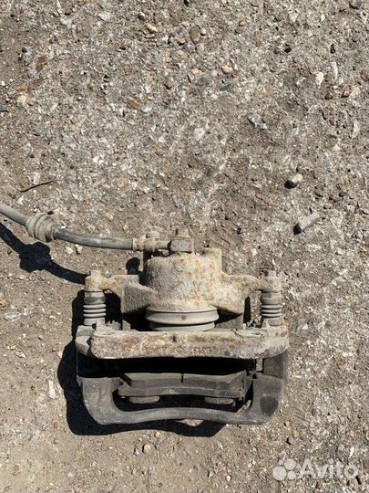 Суппорт передний левый Chevrolet Cruze