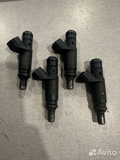 Форсунка электрическая Audi A4 06B133551T