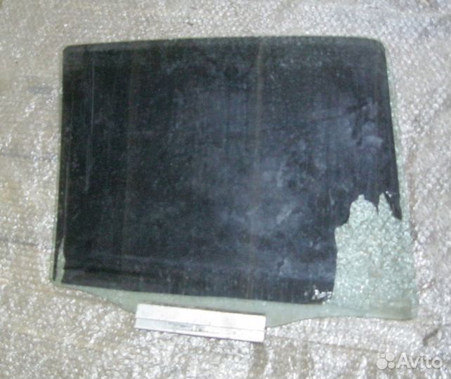 Стекло двери задней левой Daewoo Nexia