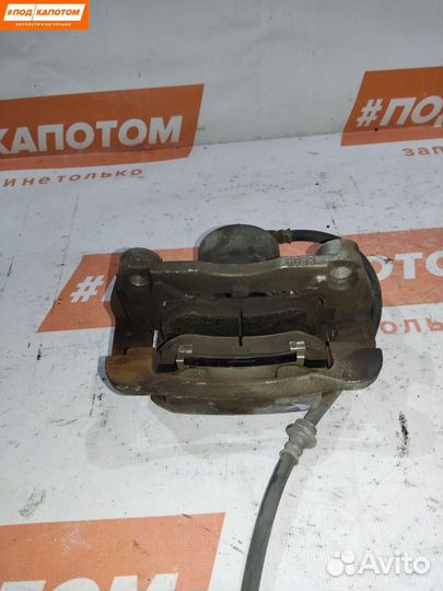 Суппорт тормозной передний правый Nissan X-Trail