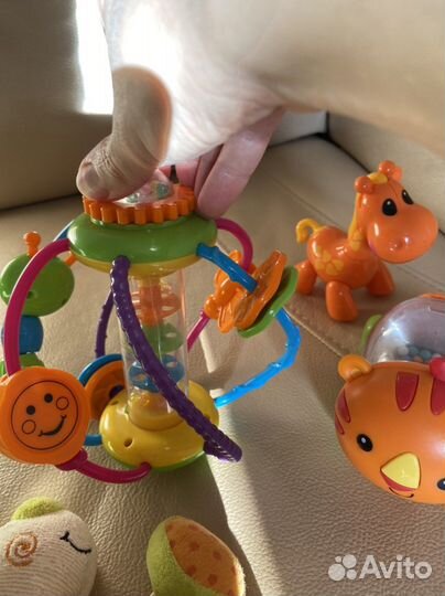 Игрушки развивающие погремушки