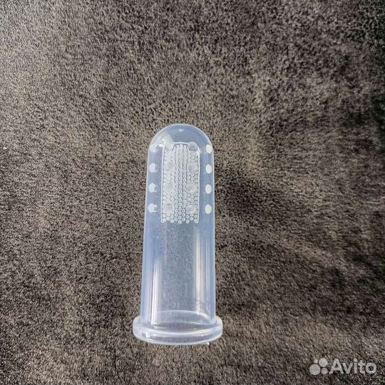 Зубная щетка на палец