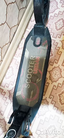 Самокат с двумя амортизаторами