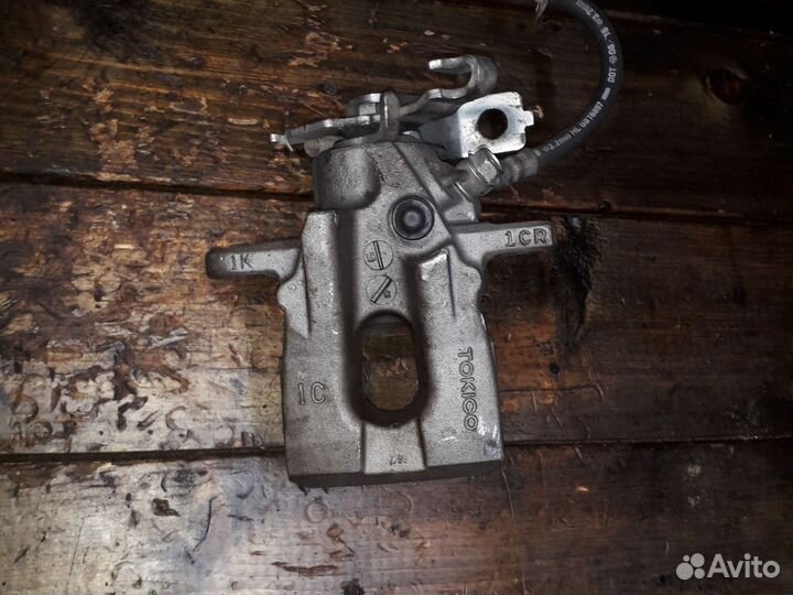 Суппорт задний toyota corolla 150