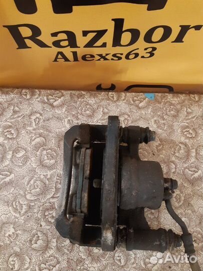 Суппорт тормозной передний Kia Picanto 2 G4LA 2011