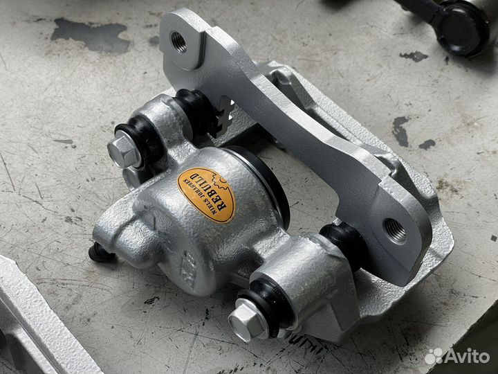 Суппорт задний Mitsubishi Pajero Sport