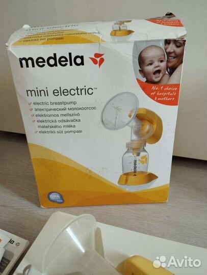 Молокоотсос medela электрический