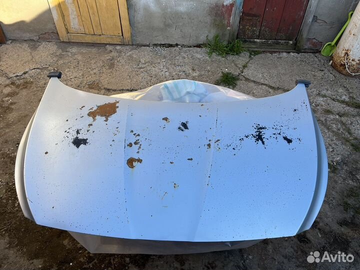 Капот solaris 2011