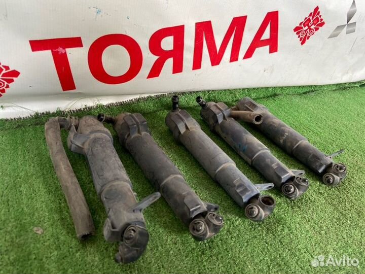 Форсунка омывателя фары левая Mercedes E-Class