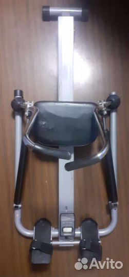 Гребной тренажер