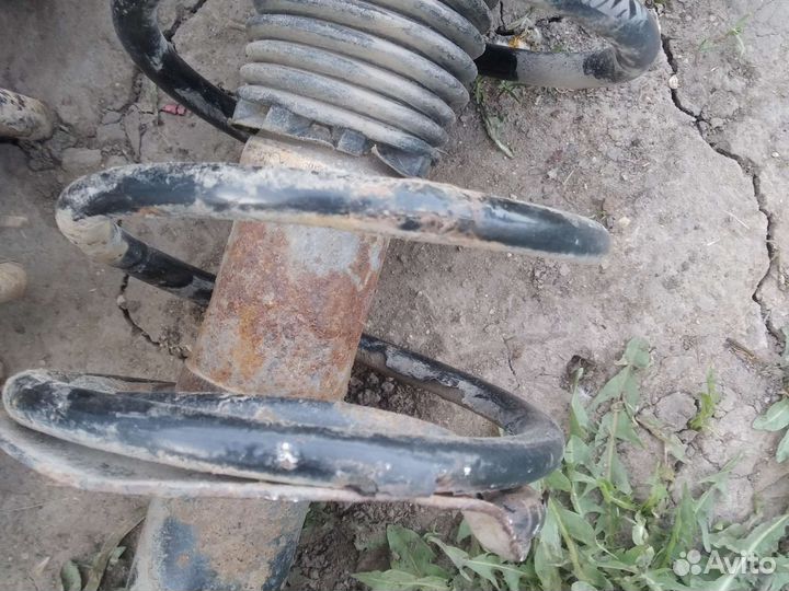 Стойки амортизатора Пежо 206