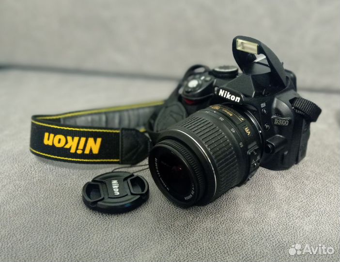 Зеркальный фотоаппарат Nikon D3100 с объективом