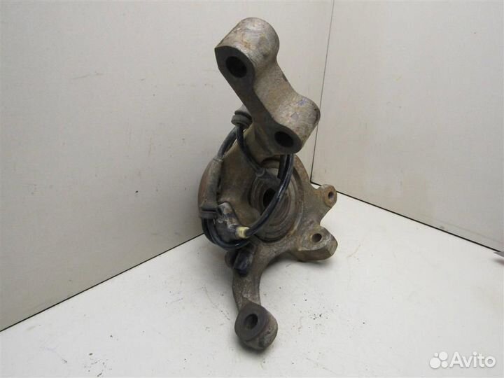 Кулак поворотный передний левый Renault Laguna 19