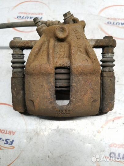 Суппорт тормозной передний правый Nissan Note 1.4