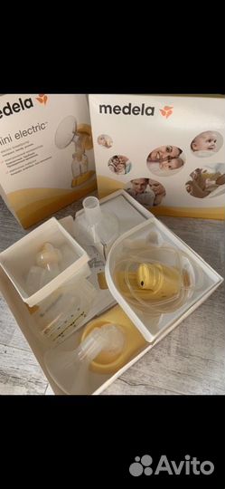 Молокоотсос Medela mini electric