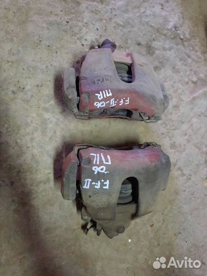 Тормозной суппорт передний Ford Focus 2