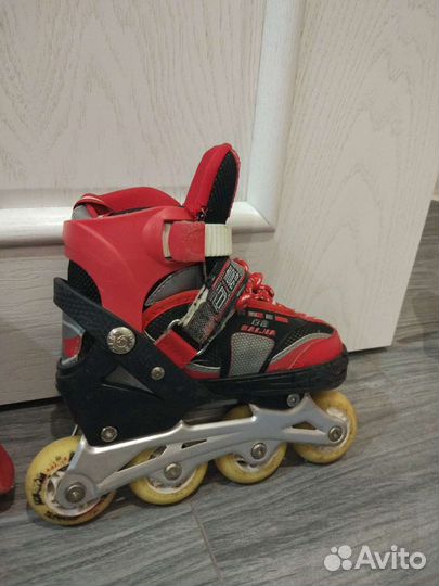 Роликовые коньки