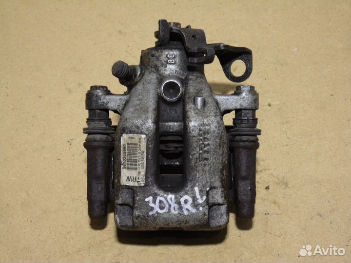 Суппорт тормозной задний левый Пежо 308