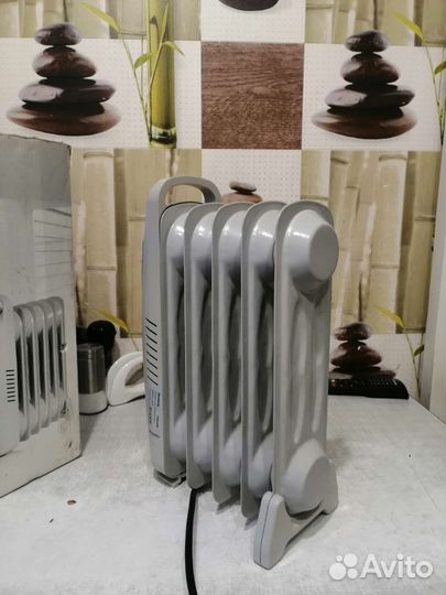 Масляный обогреватель