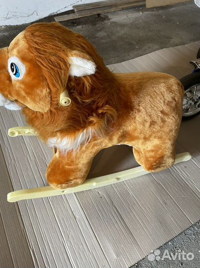 Детская игрушка качалка