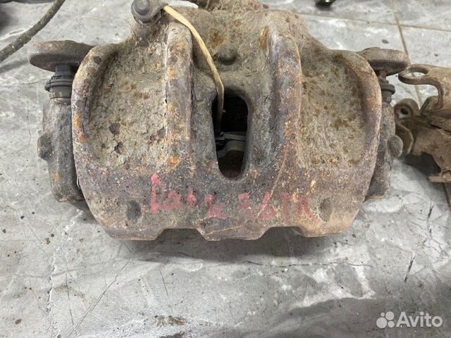 Суппорт тормозной передний левый Land Rover Range