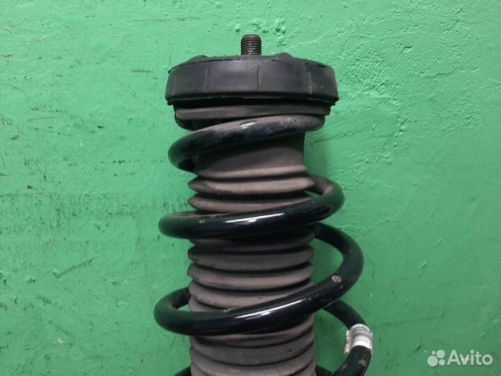 Стойка амортизатора передняя левая Opel Zafira C