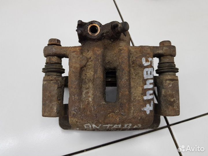 Суппорт задний левый