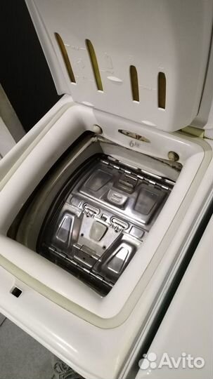 Стиральная машина вертикального типа загрузки