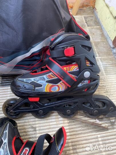 Роликовые коньки