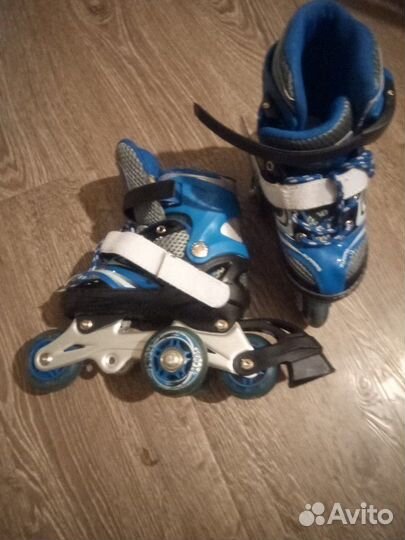 Роликовые коньки