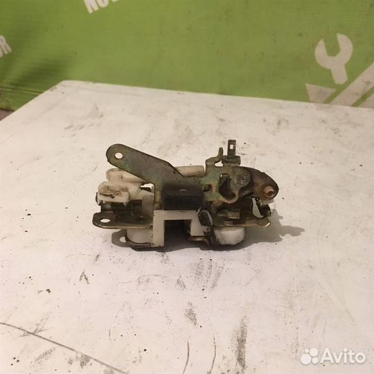 Замок двери передней правой Хонда Лого