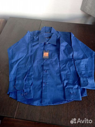 Рубашки новые синего цвета для мальчиков