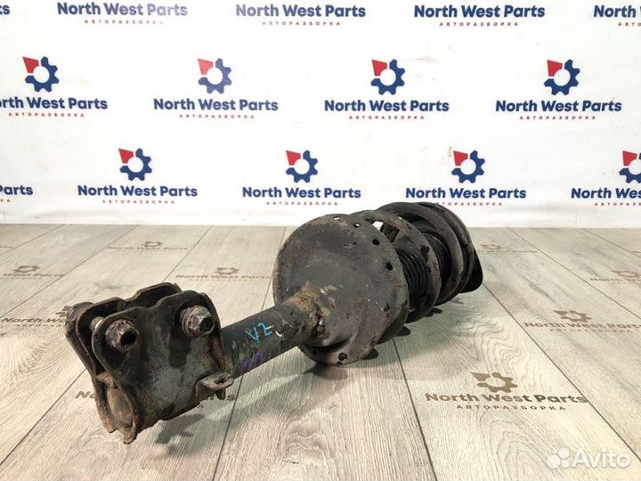 Стойка амортизатора передняя правая Subaru Outback