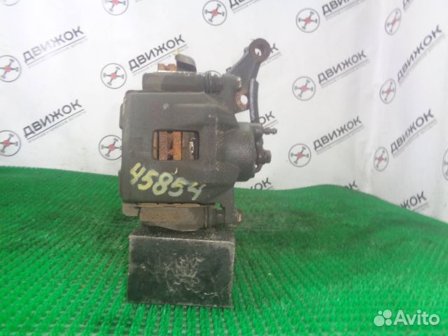 Суппорт toyota NNP10 перед право