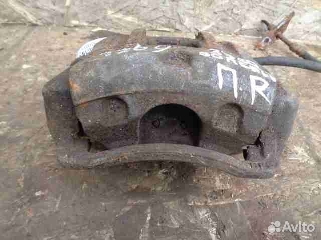 Суппорт передний правый Kia Sorento 2 XM