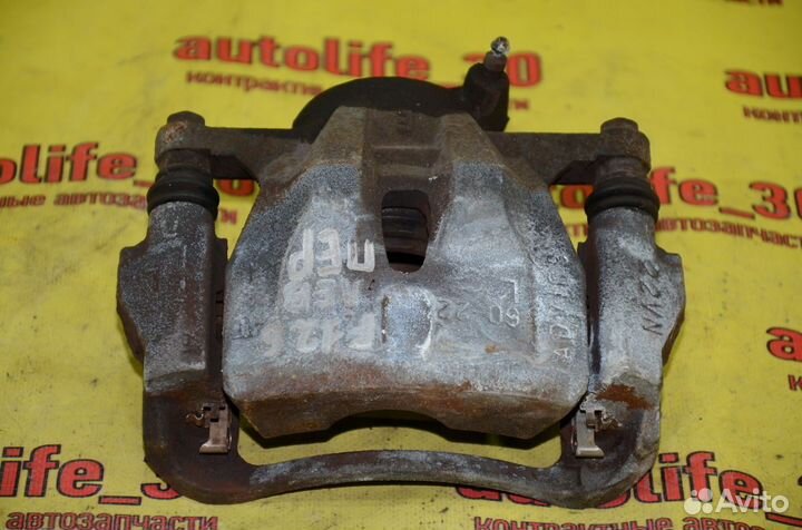 Суппорт тормозной передний левый Toyota Auris E150