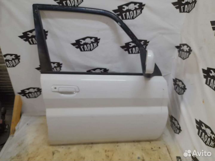 Дверь, двери Митсубиси Паджеро ио