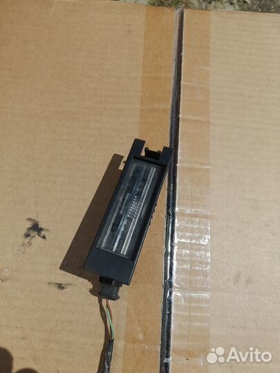 Плафон подсветки номера Opel Astra H