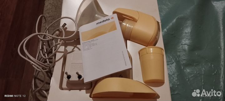 Молокоотсос medela электрический