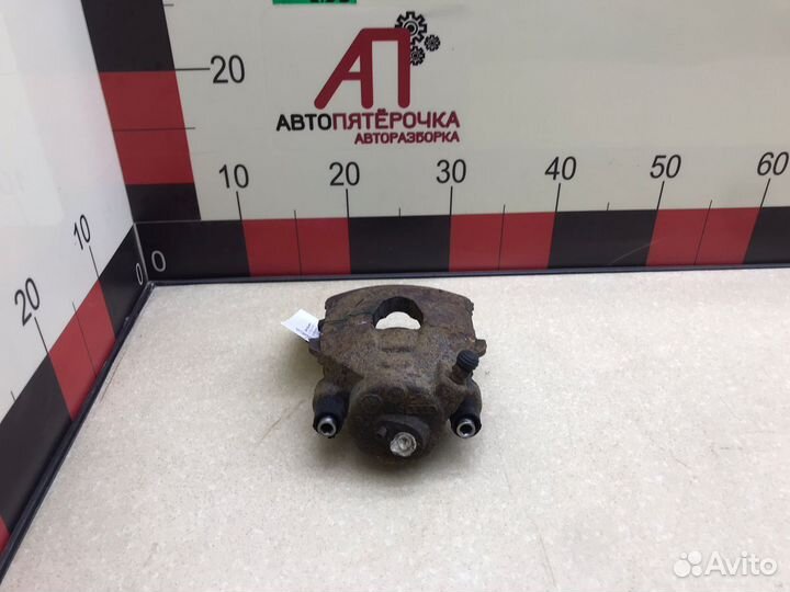 Суппорт тормозной передний левый Шкода Фабия 2