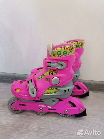 Роликовые коньки