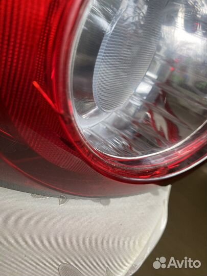 Фонарь задний mazda 9сx левый