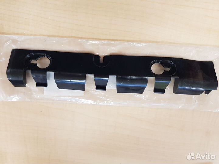 Кронштейн бампера Renault Logan задн. лев. до 2014