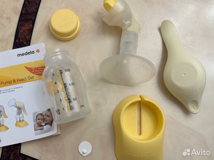 Молокоотсос medela ручной