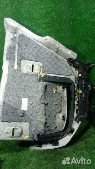 Обшивка багажника левая Opel Astra